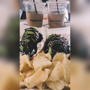 Avocado cream cheese toast with red peppercorn and umami sauce. Guava Lemonade and recommended coffee by owner.