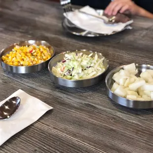 Cole slaw &amp; radishes are included with the chicken dishes. We ordered corn salad on the side.