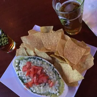 Spinach Dip appetizer with some draft beers