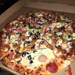 Supreme pizza with feta