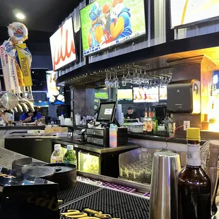 the bar counter and televisions