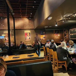 a large group of people sitting at tables