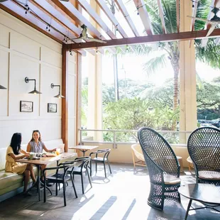a woman sitting at a table