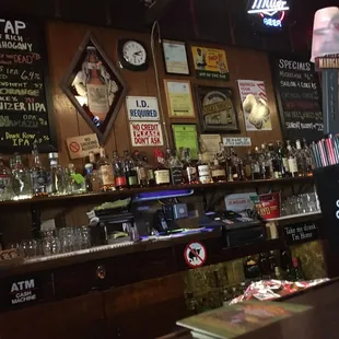 a bar with a variety of liquors