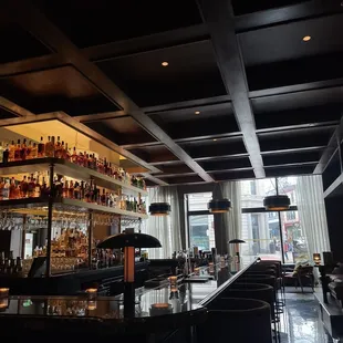 Side view of the bar with communication seating up front