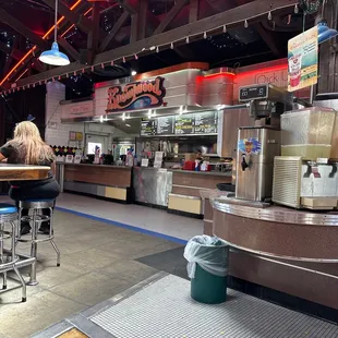 a woman sitting at a counter