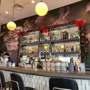 a bar with many bottles of liquor