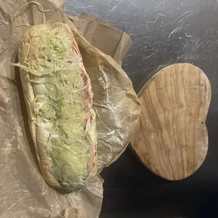 a hoagie sandwich on wax paper