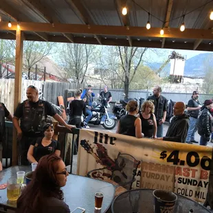 a large group of bikers