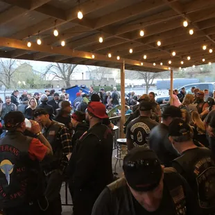 a large group of bikers