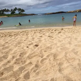 My daughter testing the water