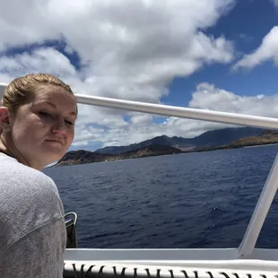 Girl on the boat on the way to snorkeling.