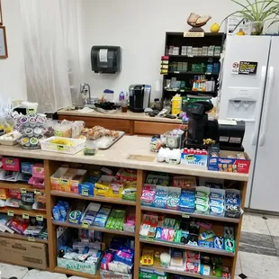 Cigarettes, lighters, medicine, feminine hygiene products, breath fresheners, and cash register