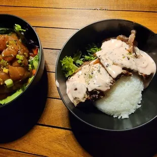 two plates of food on a wooden table