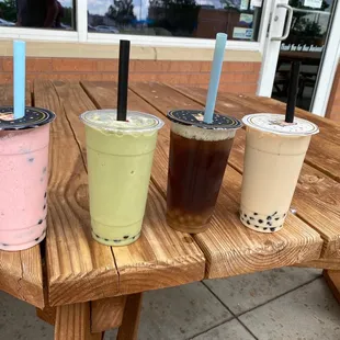 Strawberry bananas smoothie, matcha green tea smoothie, peppermint tea with honey boba and vanilla cream tea