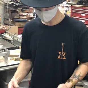 Ian, our guide explaining about the ebony fret board.