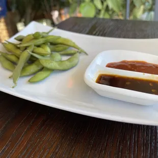 Edamame with hot sauce dips