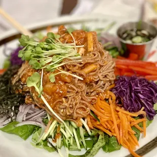 JangBan GukSoo with acorn noodles, assortment of veg, gochujang dressing (spicy sweet vinegary) mix &amp; eat $26.99.     4*