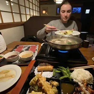 a man eating at a restaurant