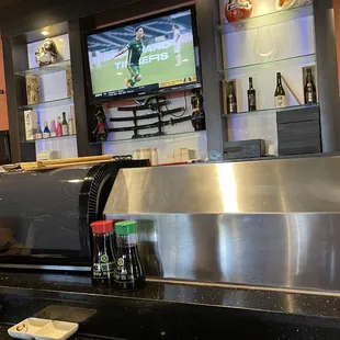 Sitting at the sushi bar