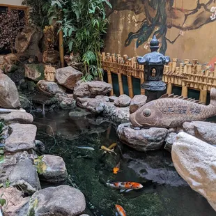 There is a nice soothing sound of waterfalls and music  in the restaurant. Beautiful koi as well.