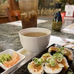 Spicy tuna roll, Miso soup, and diet Pepsi.
