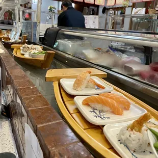 Sushi boat dining is fun!