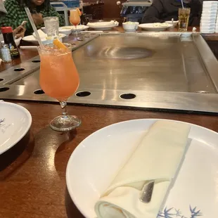 a plate of food and a drink