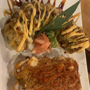 The sushi plates are always so beautiful! This is the Volcano Roll and Bagel Roll