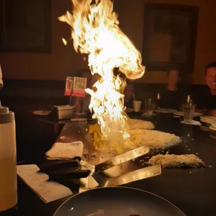 a plate of food on fire
