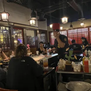 a group of people in a restaurant