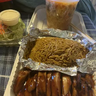 Hot and sour soup, salad, teriyaki chicken, and lo mein.