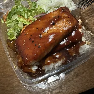 Salmon Teriyaki - sorry for the partially eaten plate  2 salmon filets over rice White noodle Salad w/ Sesame Dressing