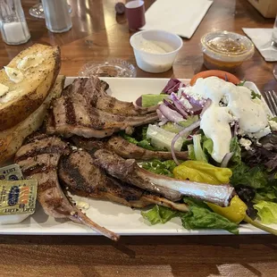 Lamb chops and potatoes and salad