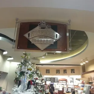 a clock hanging from the ceiling