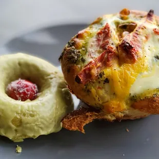 Matcha Doughnut &amp; Egg Brioche Pastry w/ sundried tomato and broccoli from prosperity kitchen.