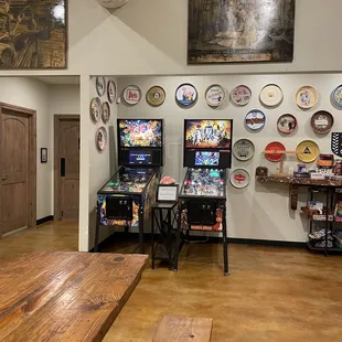a row of pinball machines