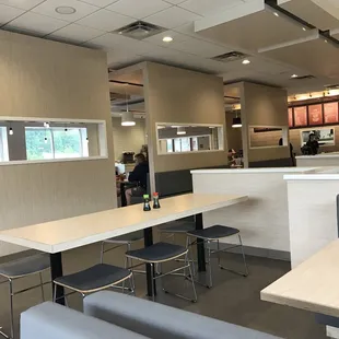 a restaurant with tables and chairs