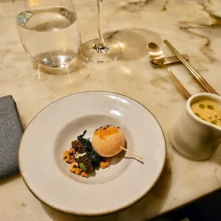 Sweet Potato Soup
 chapsal beignet, caramelized apple, toasted yulmu, caviar