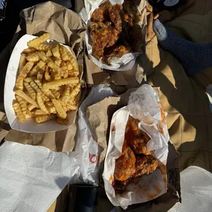 Garlic soy drumsticks, hot honey wings, large fries