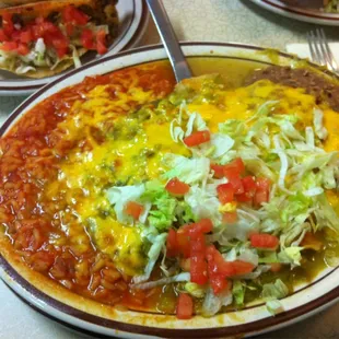 Tamale and enchilada smothered in green chili