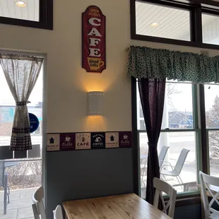 a table and chairs in a coffee shop