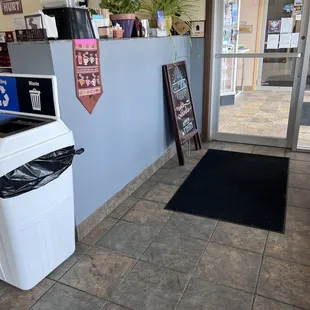 the entrance to a coffee shop