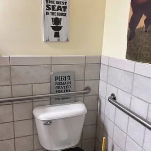 a toilet in a public restroom