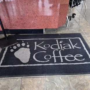 a coffee shop with a sign that says kodiak coffee