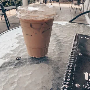 They have a patio in the front. Pictured is an iced Carmel latte.