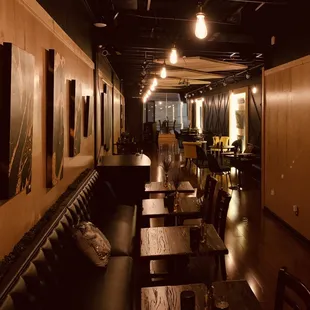 an empty restaurant with tables and chairs