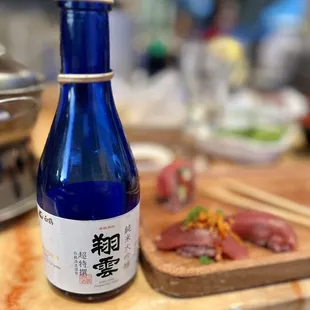 a blue bottle of sake