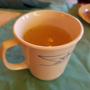 Cup of chicken broth, weird man!