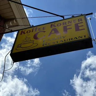 a sign for a cafe